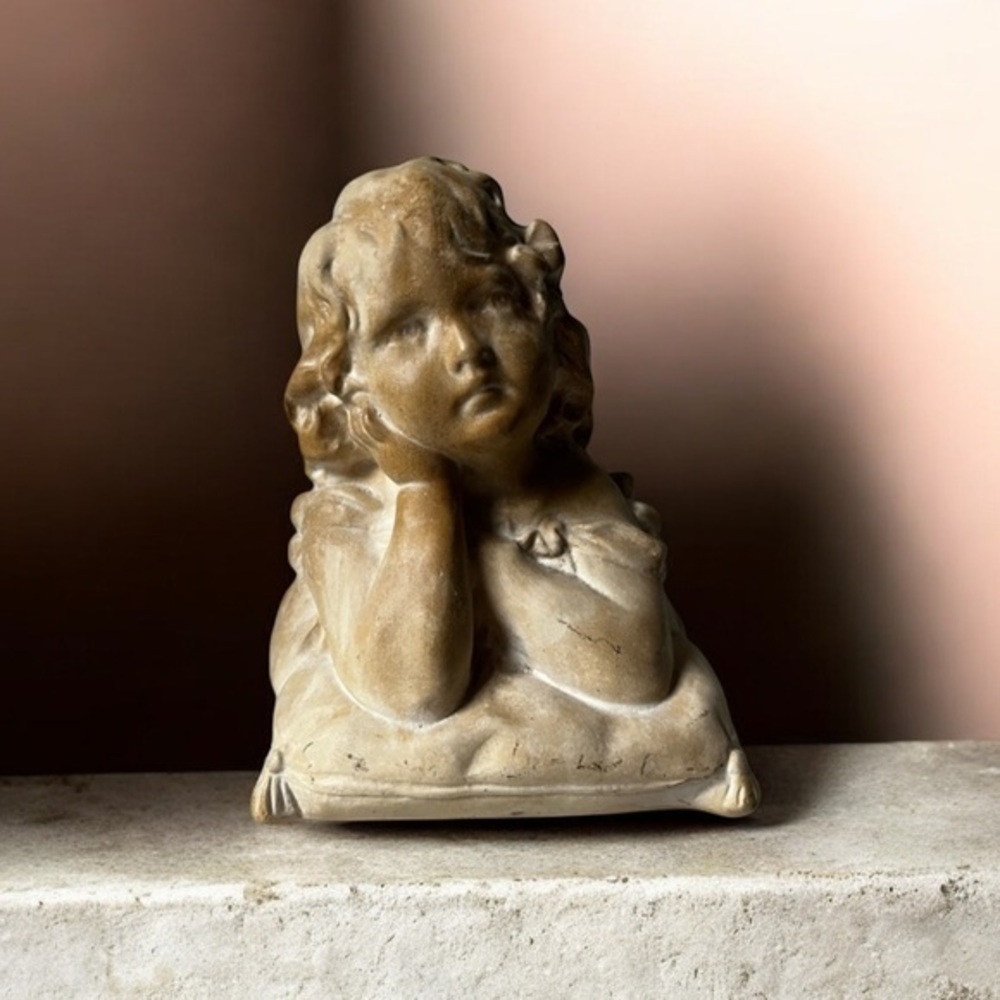 vintage chalkware bust of a little girl.